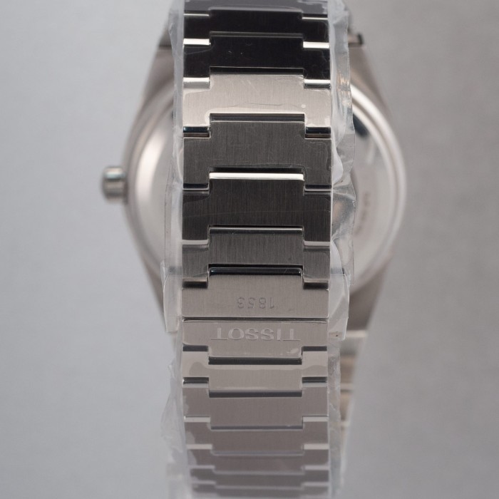 Tissot - PRX Automatic with unique salmon dial