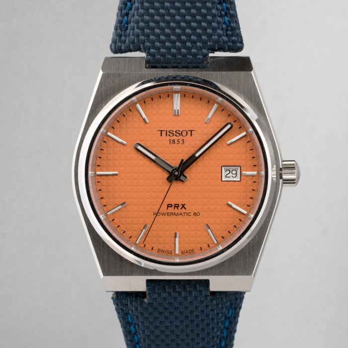 Tissot - PRX Automatic with unique salmon dial